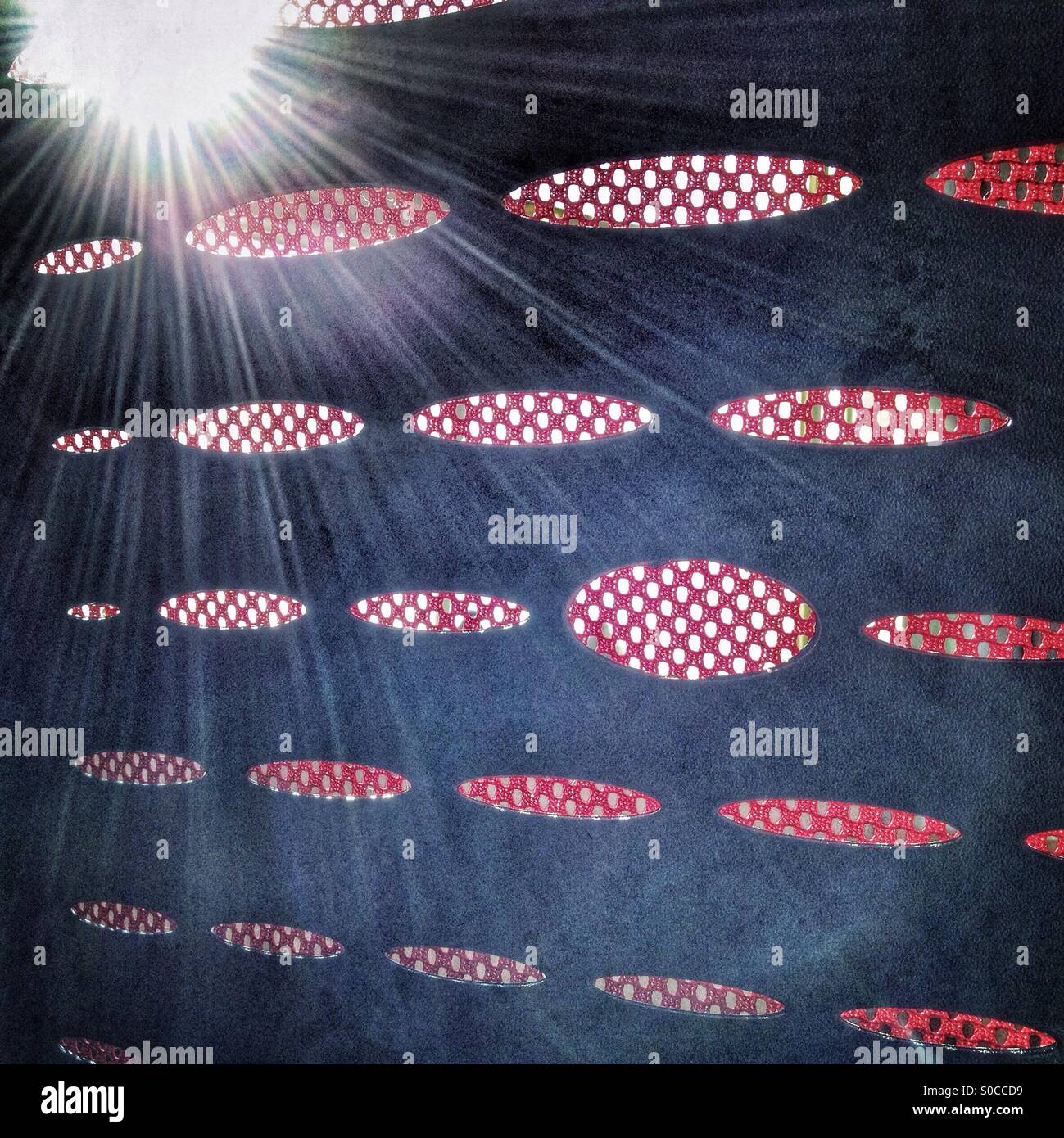 Light shining through the back of an office chair. - Smartphone Captured Stock Image