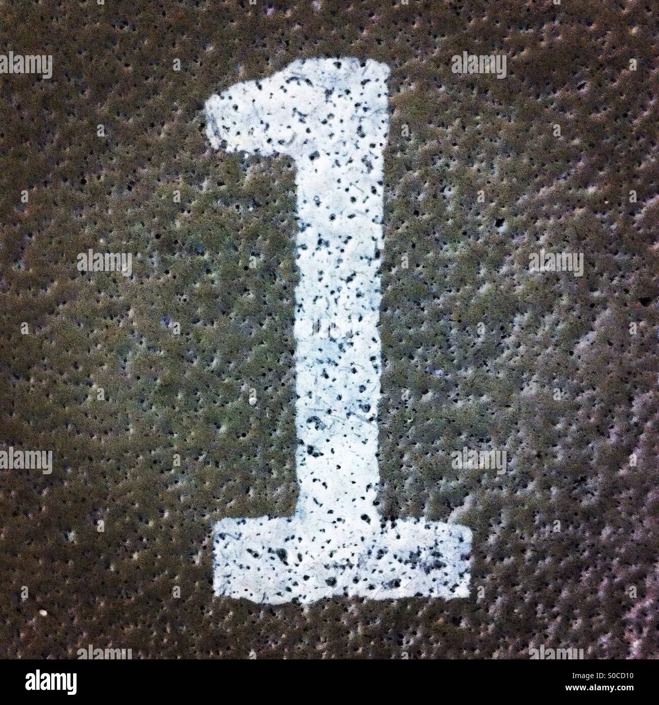 Number 1 painted on the floor - Smartphone Captured Stock Image