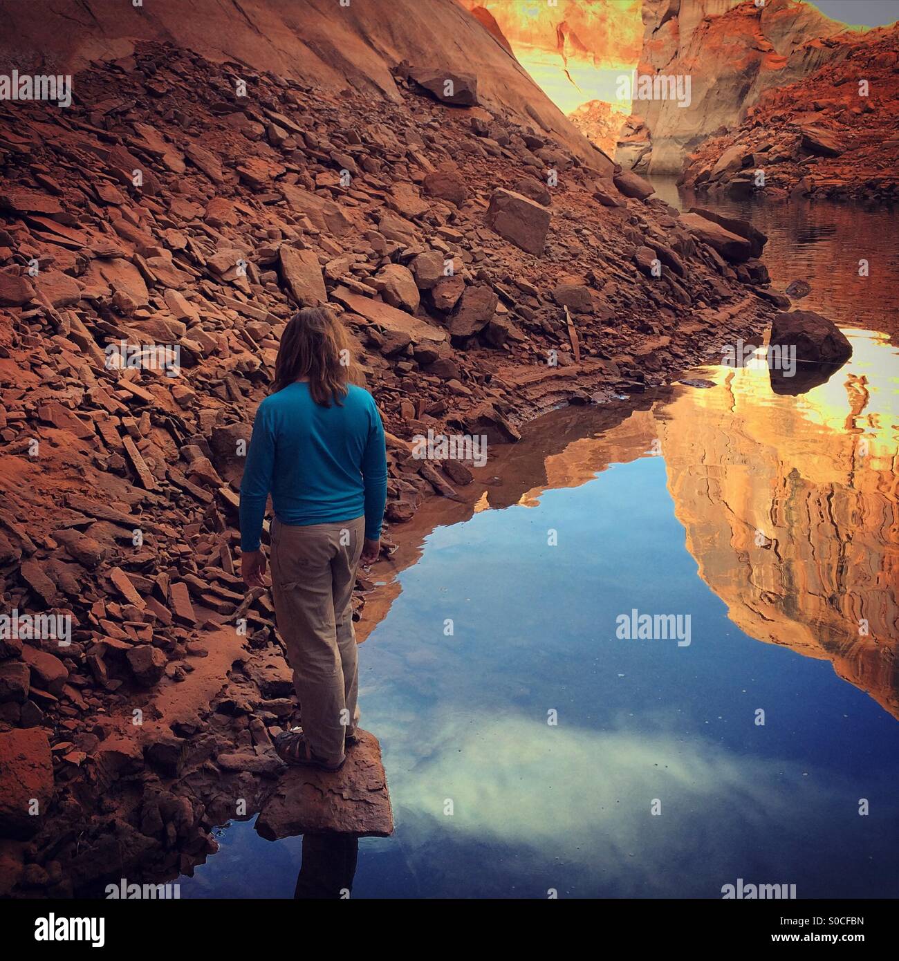 Person and reflection Lake Powell Stock Photo