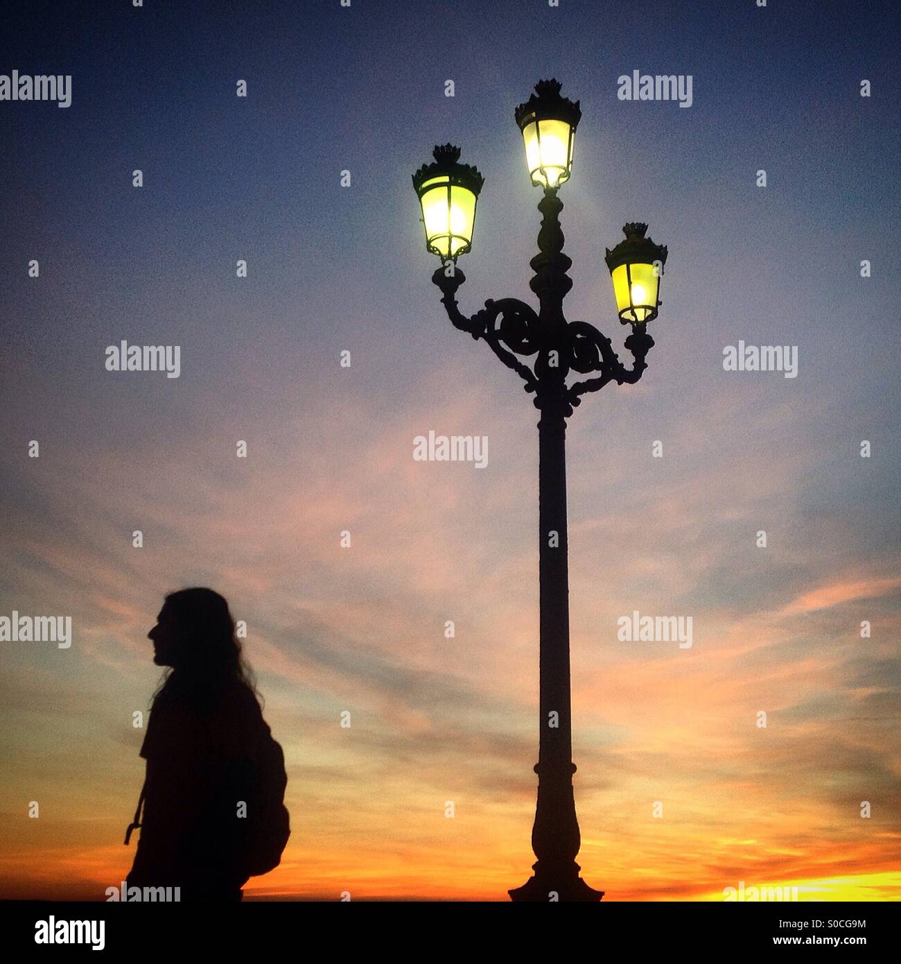 Silhouette street lamp sunset hi-res stock photography and images - Alamy