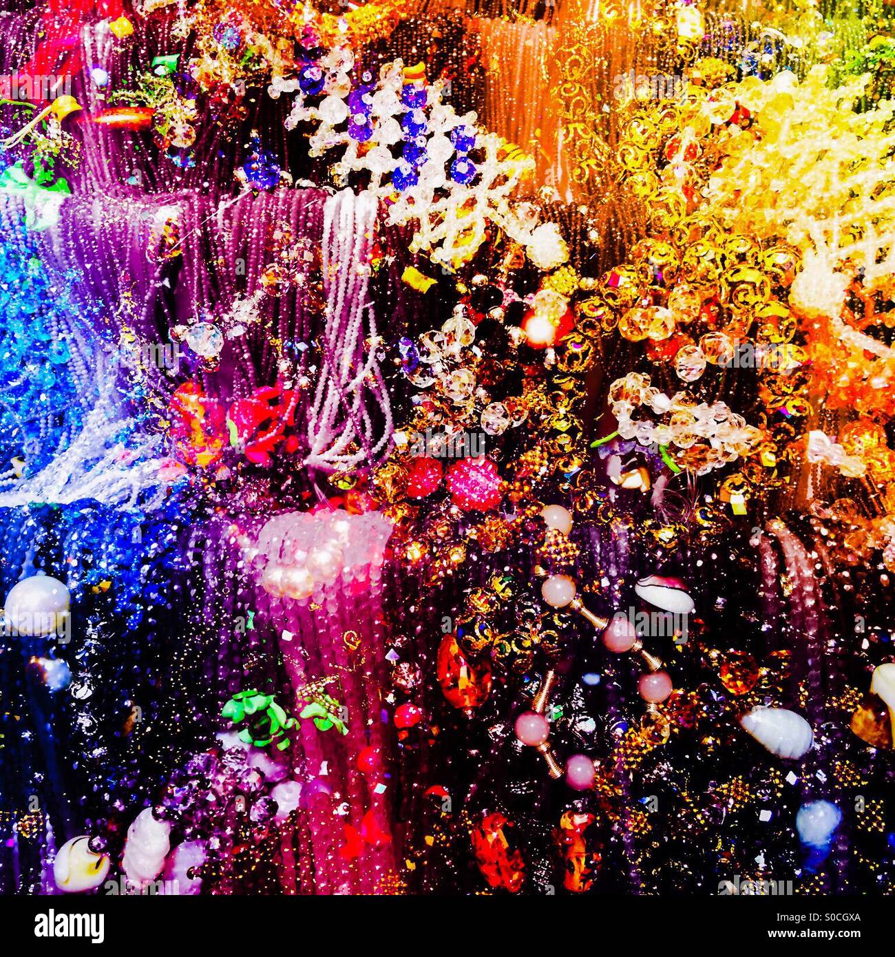 Double exposure of bracelets merged with beaded necklaces - Smartphone Captured Stock Image