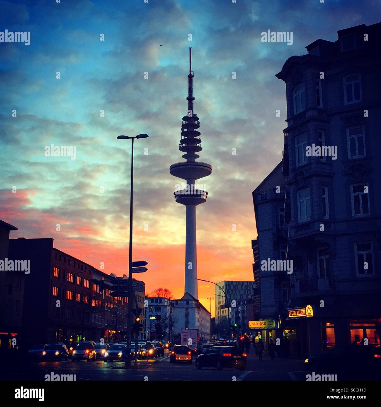 Hamburg's TV tower in front of an orange sunset Stock Photo