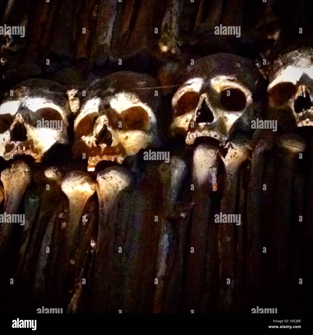 Human skulls and bones decorate yhe Capela dos Ossos ( Bones Chapel ) in Evora, Portugal Stock Photo