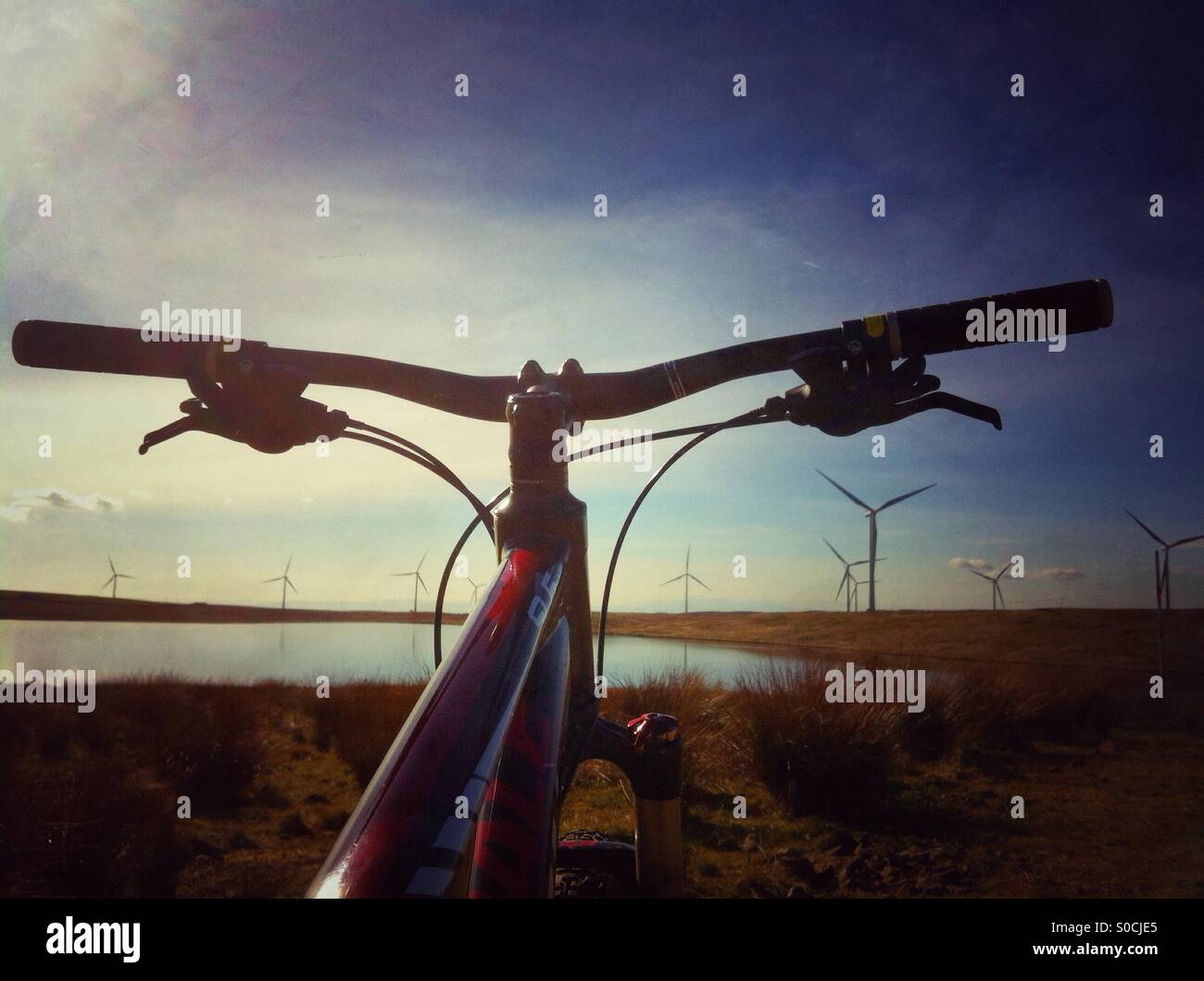 Bike at windfarm. - Smartphone Captured Stock Image