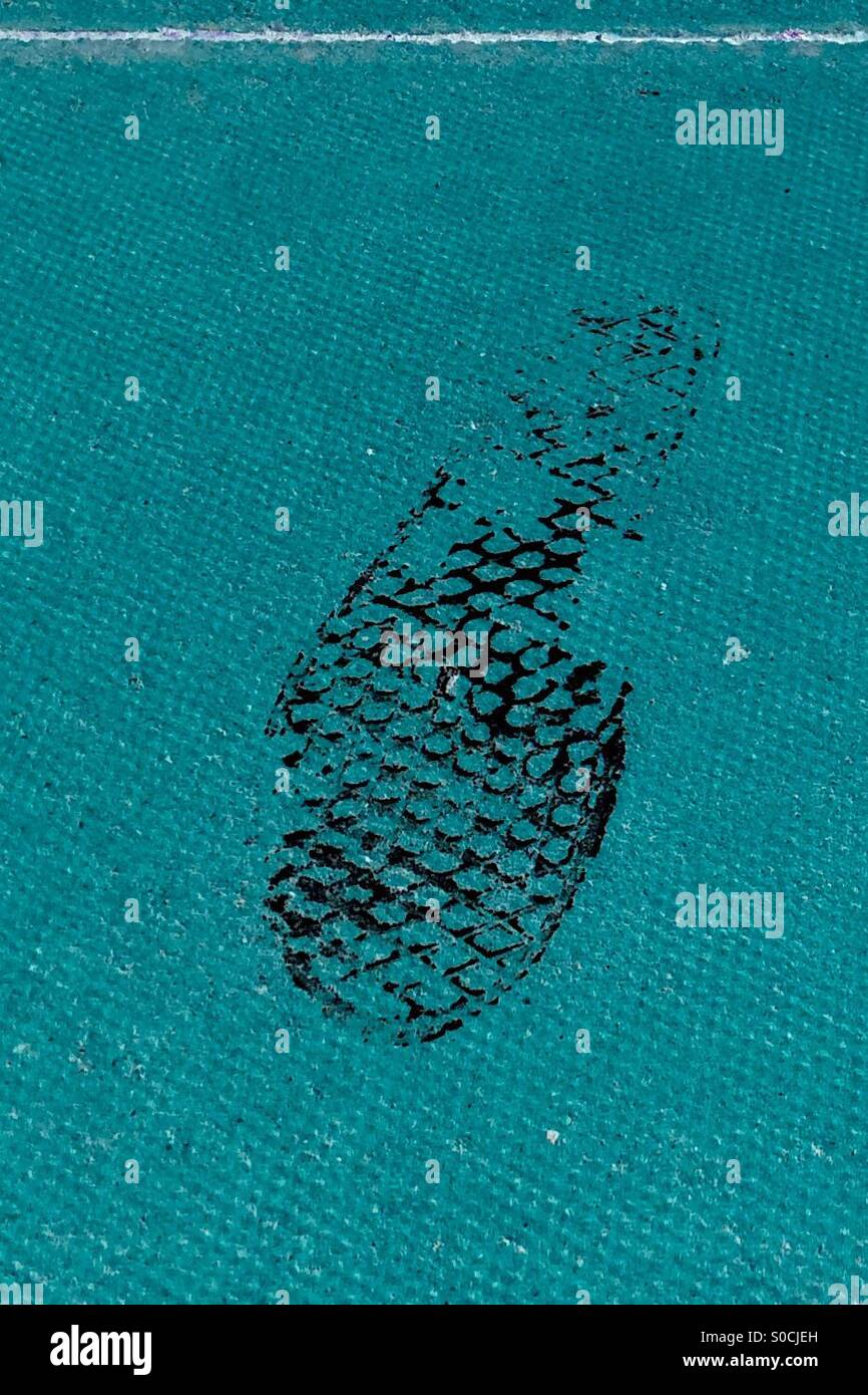 Footprint on a pavement. - Smartphone Captured Stock Image