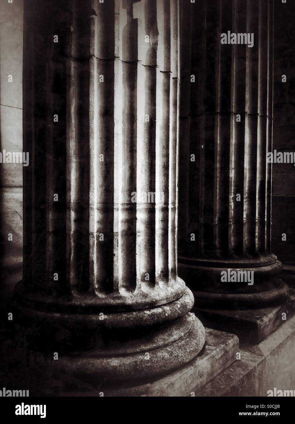 Fluted columns on Victorian building. - Smartphone Captured Stock Image