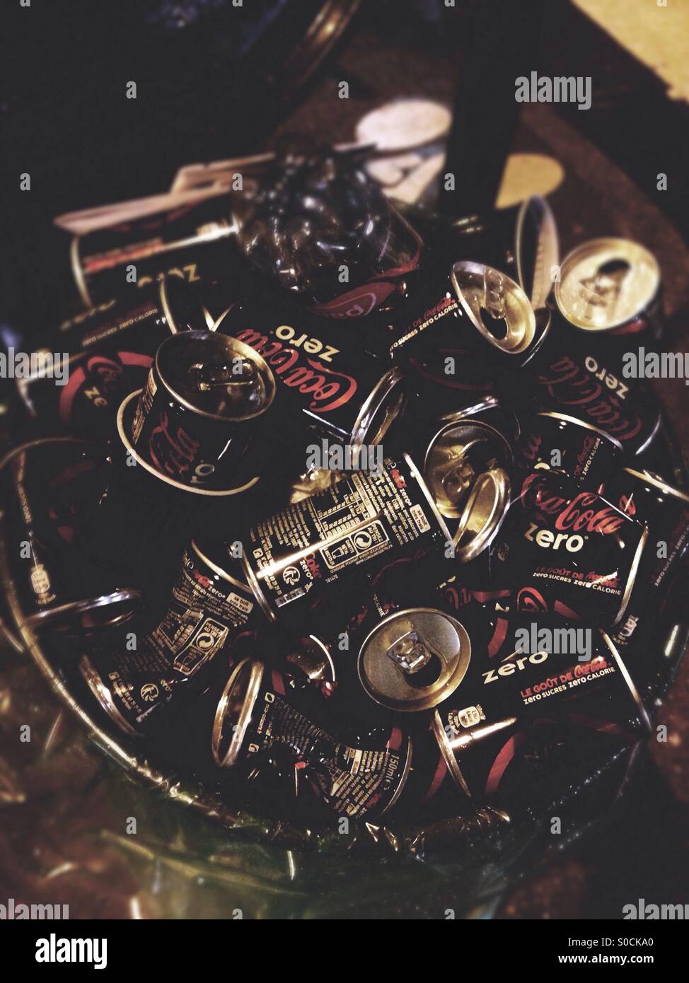 Coca cola zero cans in recycle bin, France - Smartphone Captured Stock Image
