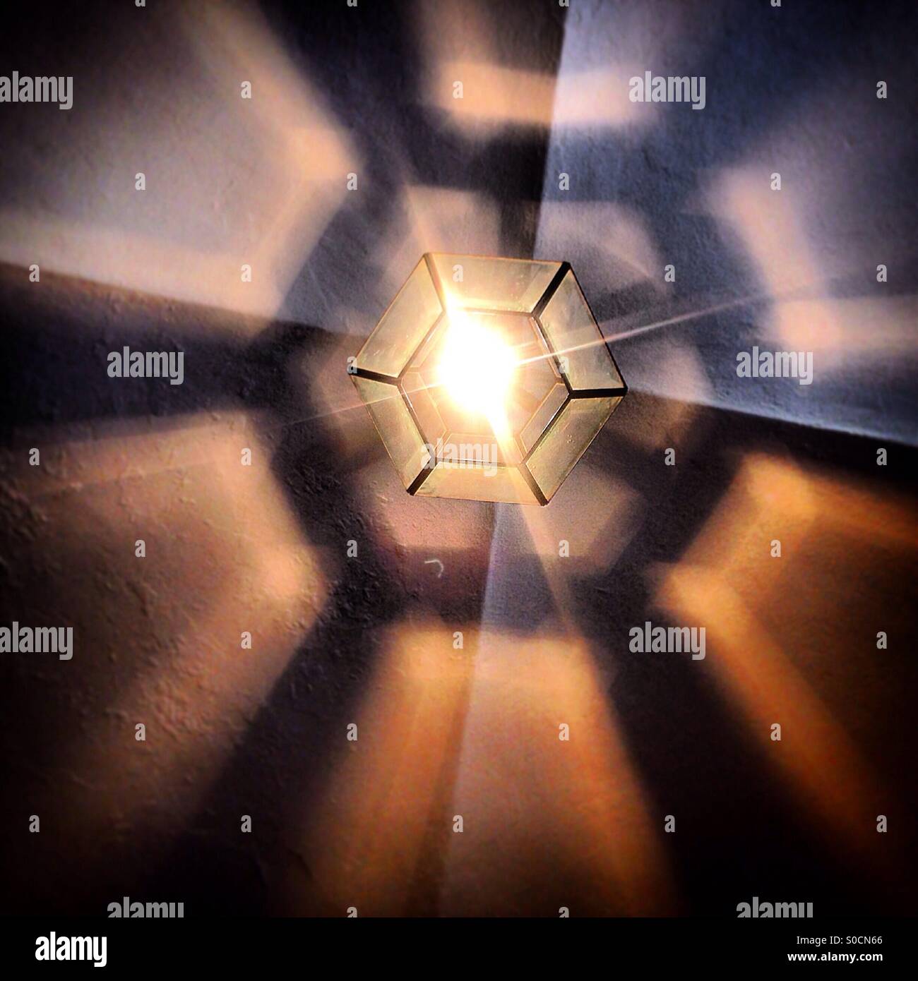 Hexagonal lamp in a house of Trujillo, Extremadura, Mexico - Smartphone Captured Stock Image