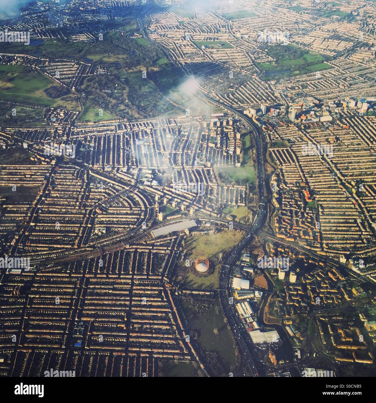 Flying over the suburbs of London Stock Photo