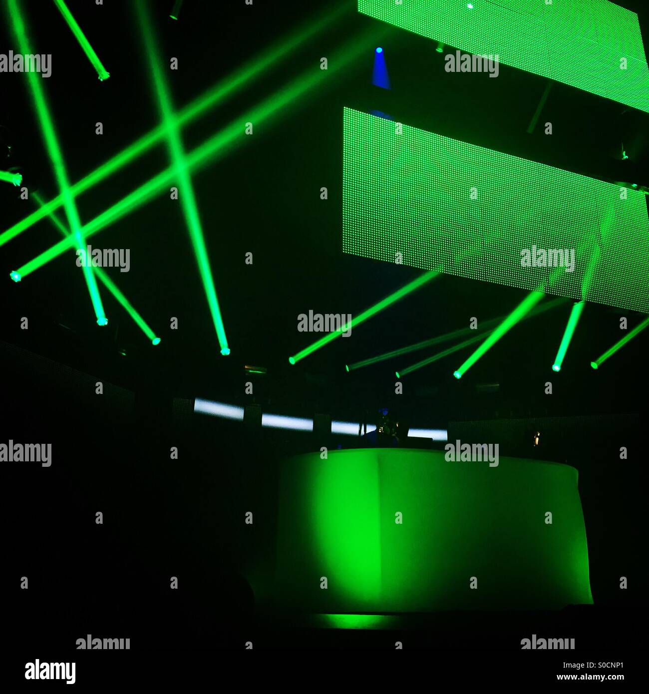 Green light display at a music concert Stock Photo