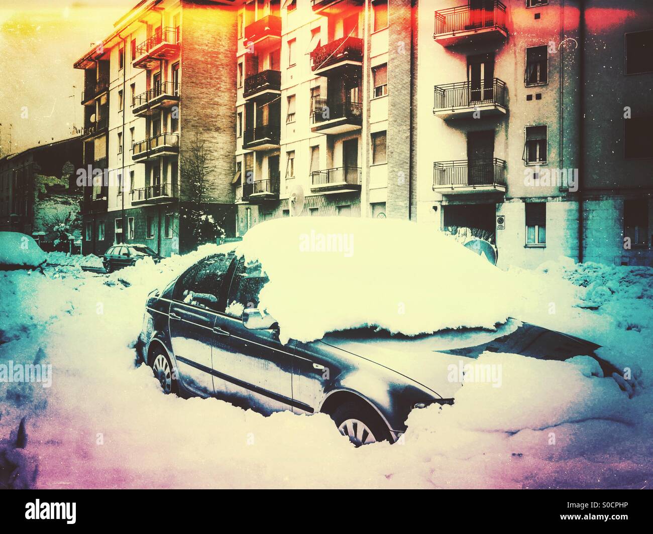 Bmw sleeps freezed under the snow . - Smartphone Captured Stock Image
