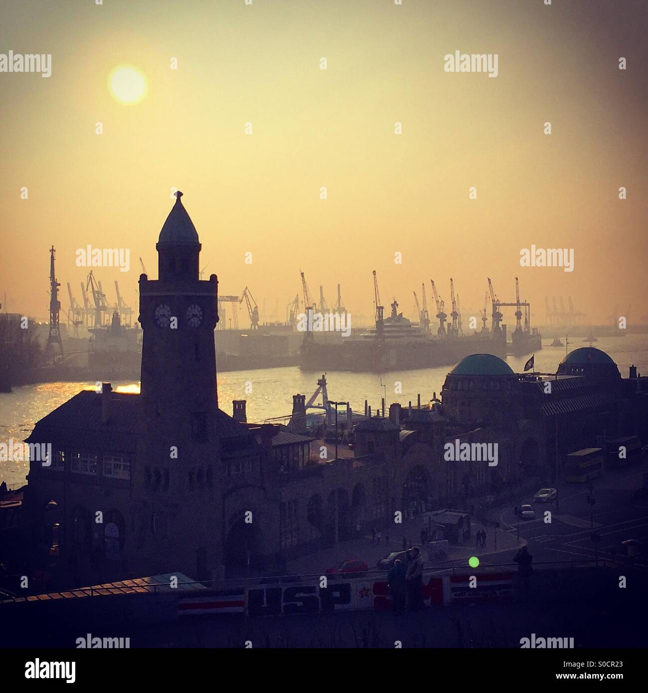 Hazey sunshine over Hamburg harbour Stock Photo