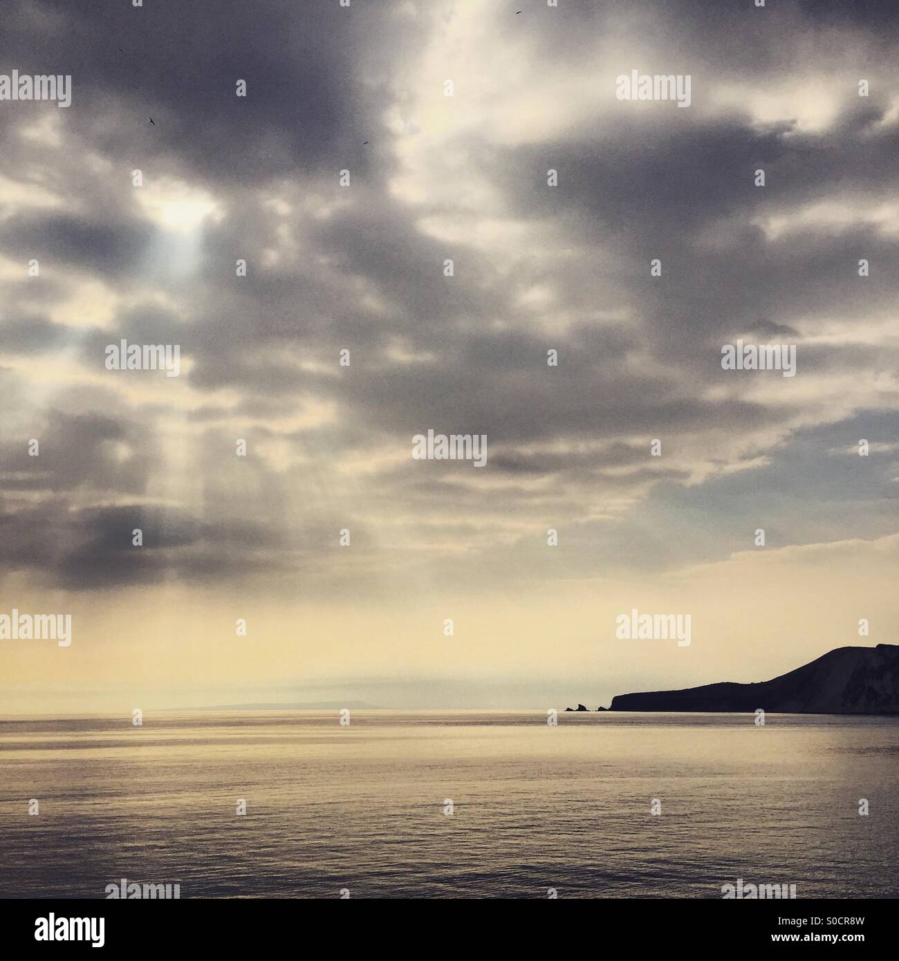 Worbarrow bay heaven Rays - Smartphone Captured Stock Image