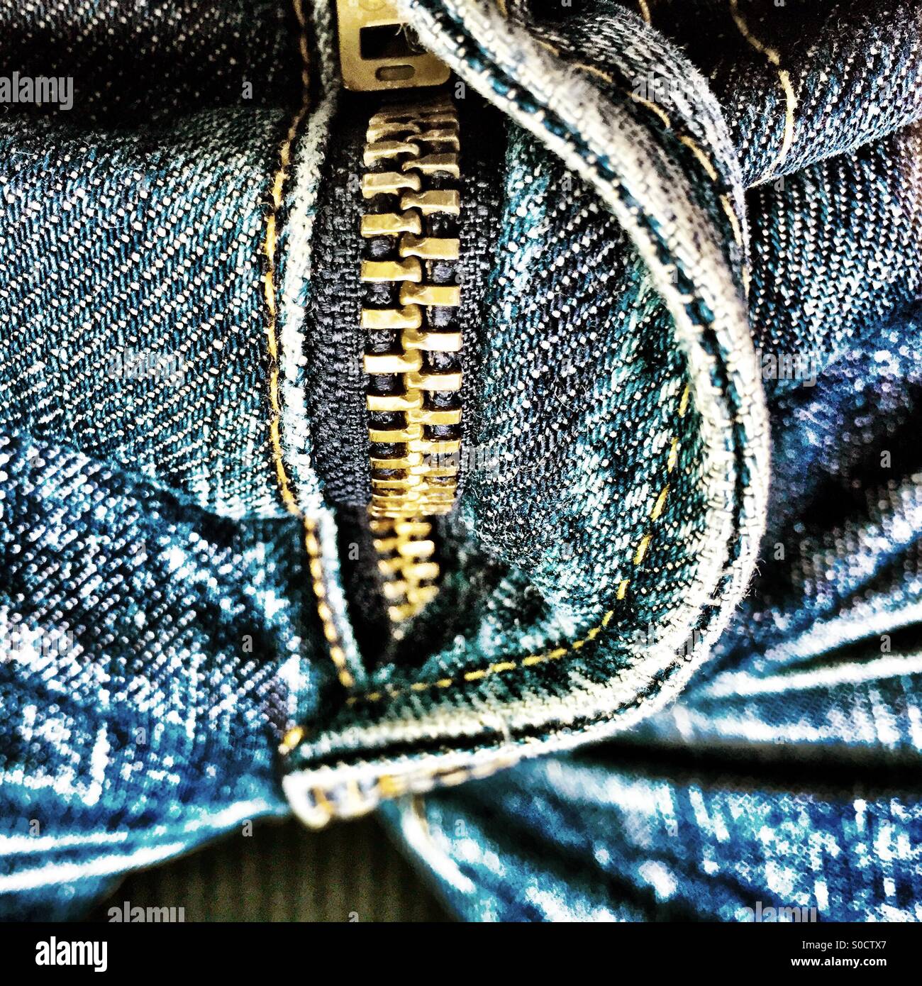 A zip on a pair of jeans Stock Photo