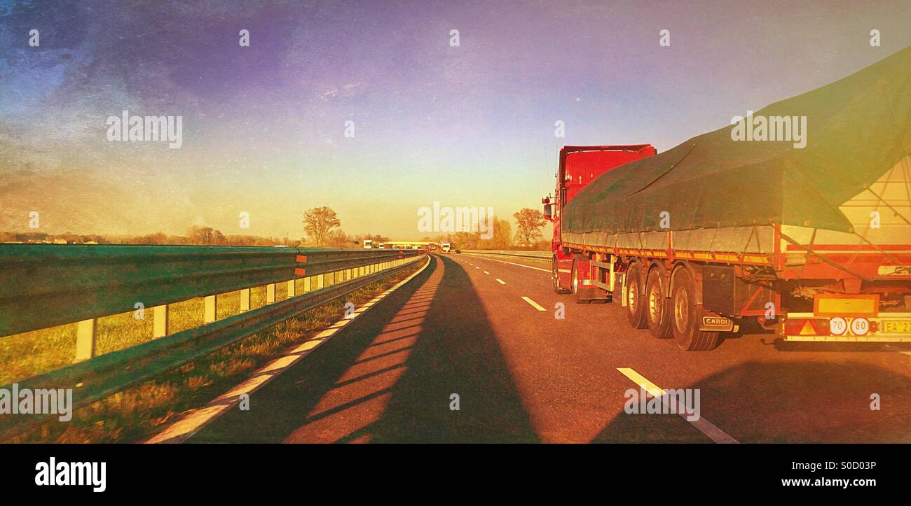 cargo long Truck on highway - Smartphone Captured Stock Image