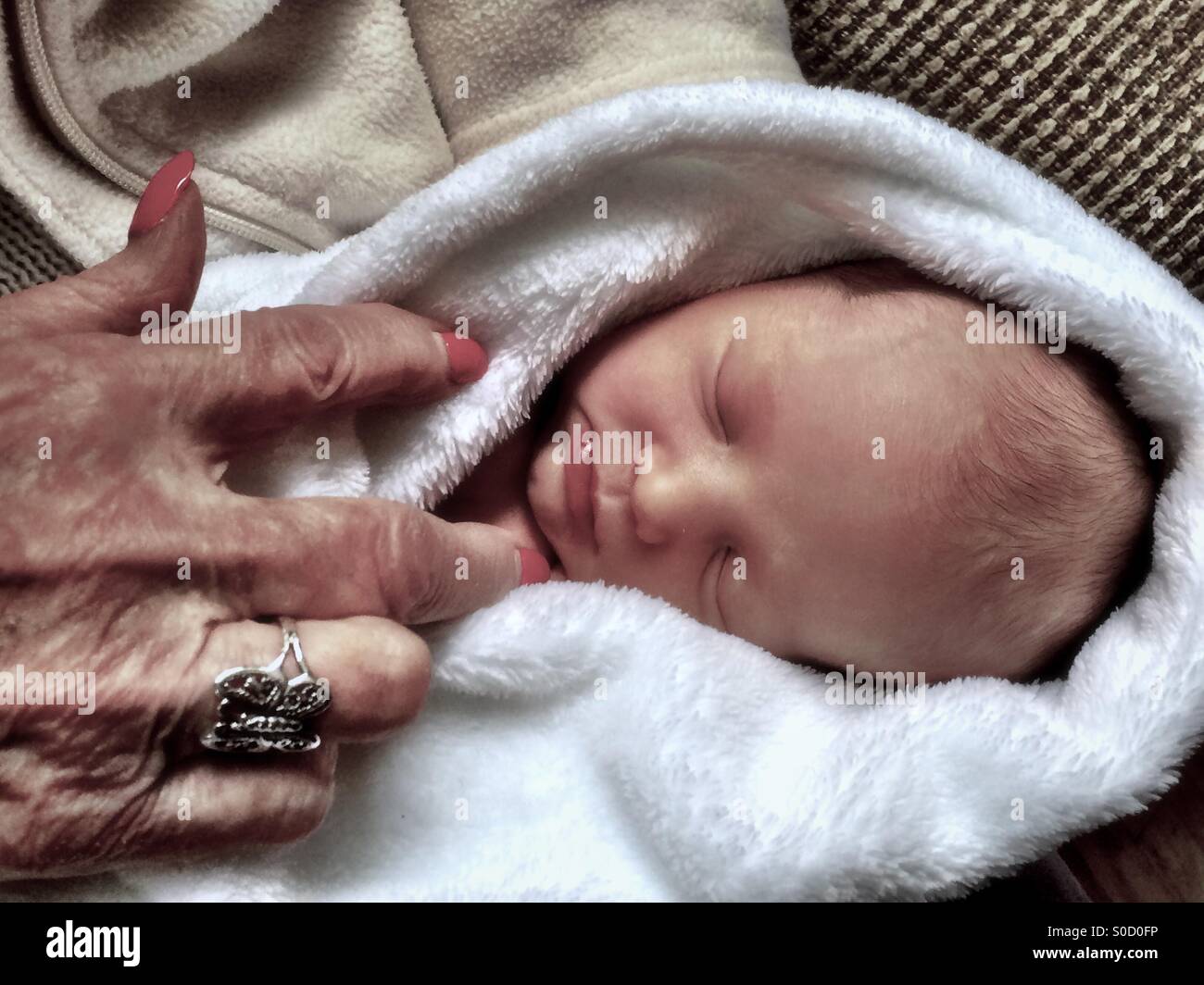 Great grandma and infant - Smartphone Captured Stock Image