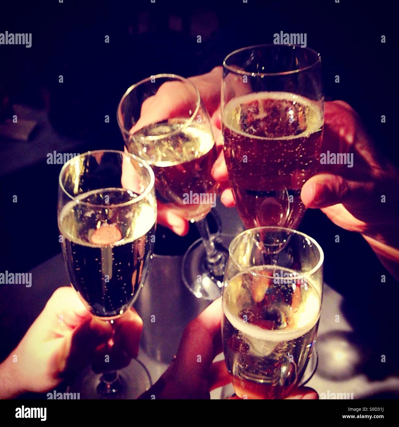 champagne celebrate party celebration toast glasses chink Stock Photo