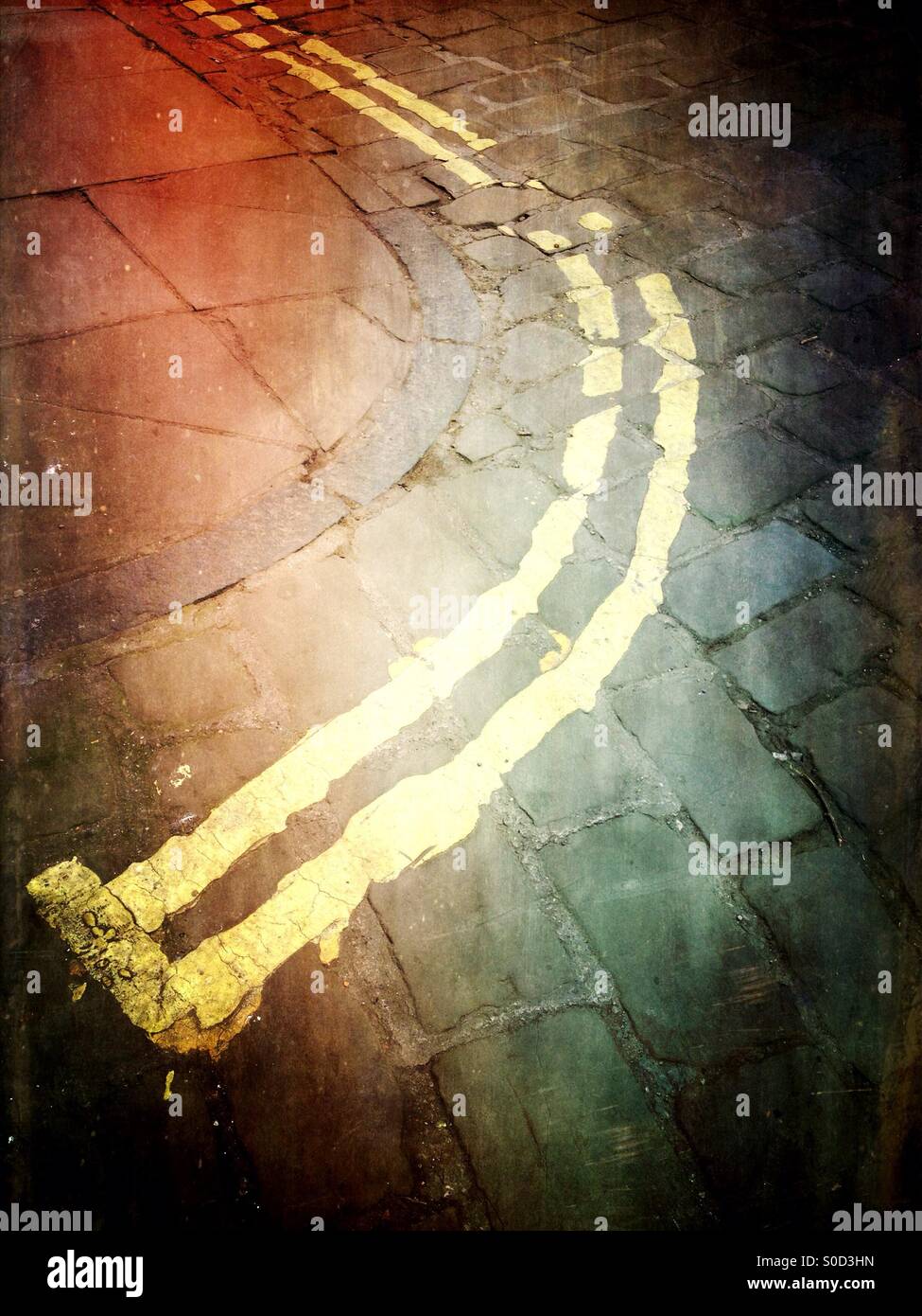 Double yellow road markings on street corner - Smartphone Captured Stock Image