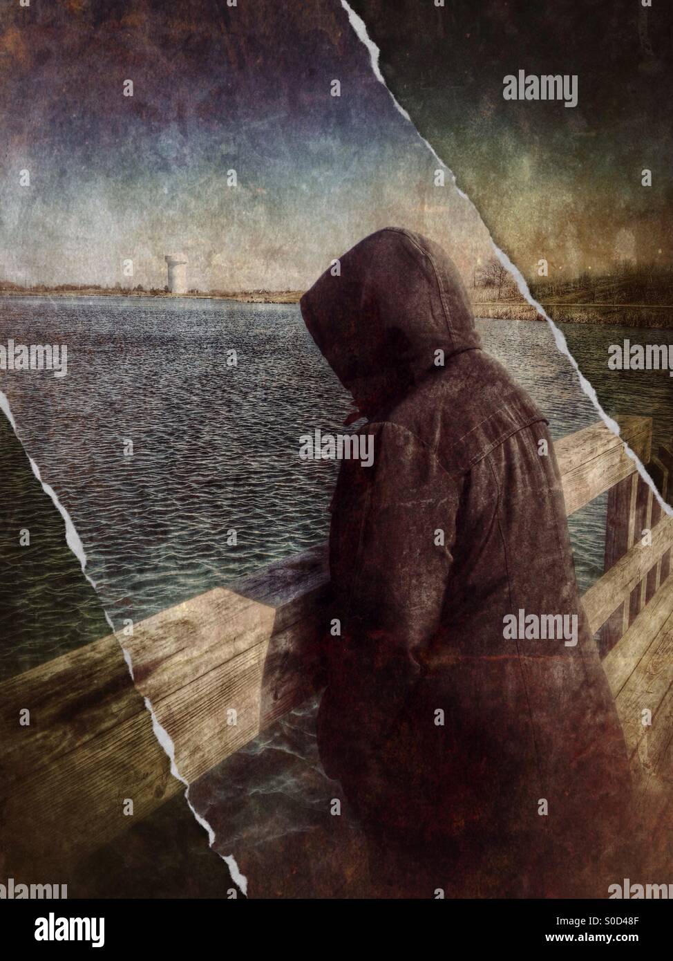 A lady with hooded jacket walking across a bridge (4). - Smartphone Captured Stock Image