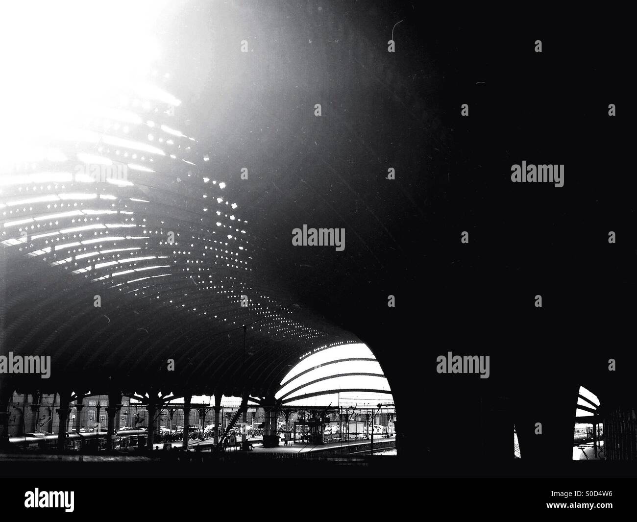 Train station with shafts of light - Smartphone Captured Stock Image