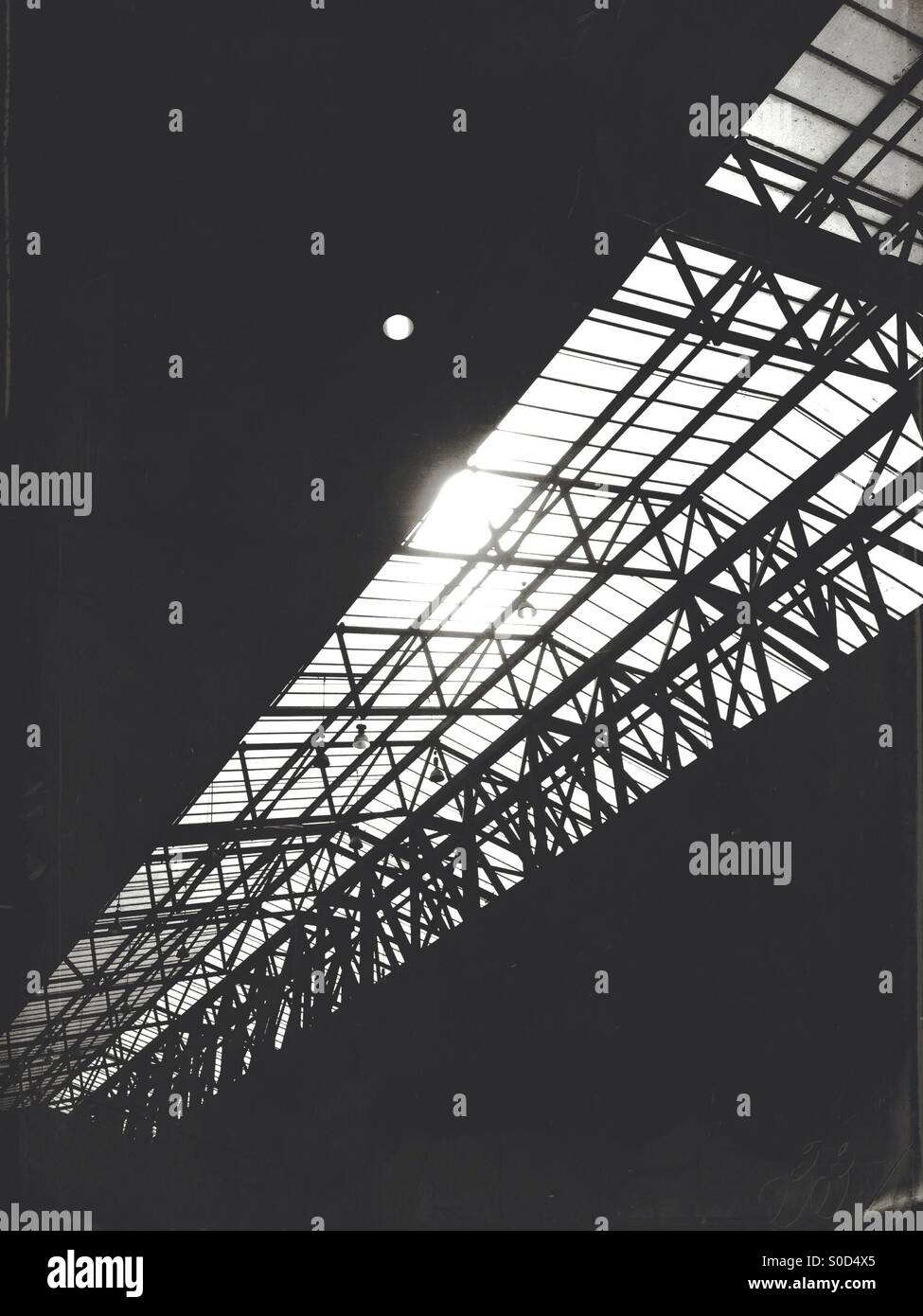 Sunlight through intricate roofing - Smartphone Captured Stock Image