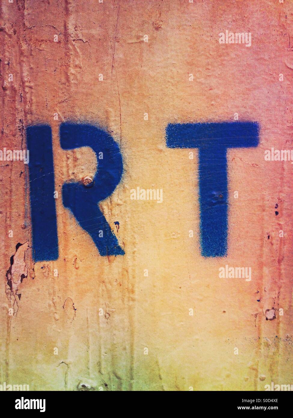 Spray painted blue letters 'RT' Stock Photo