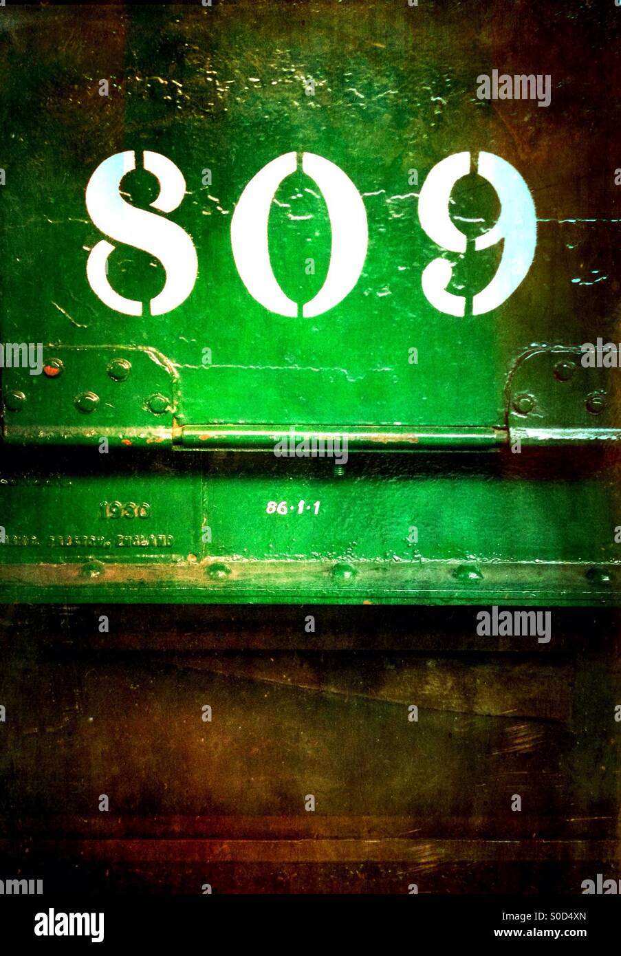 Green train carriage with the number '809' transferred on Stock Photo