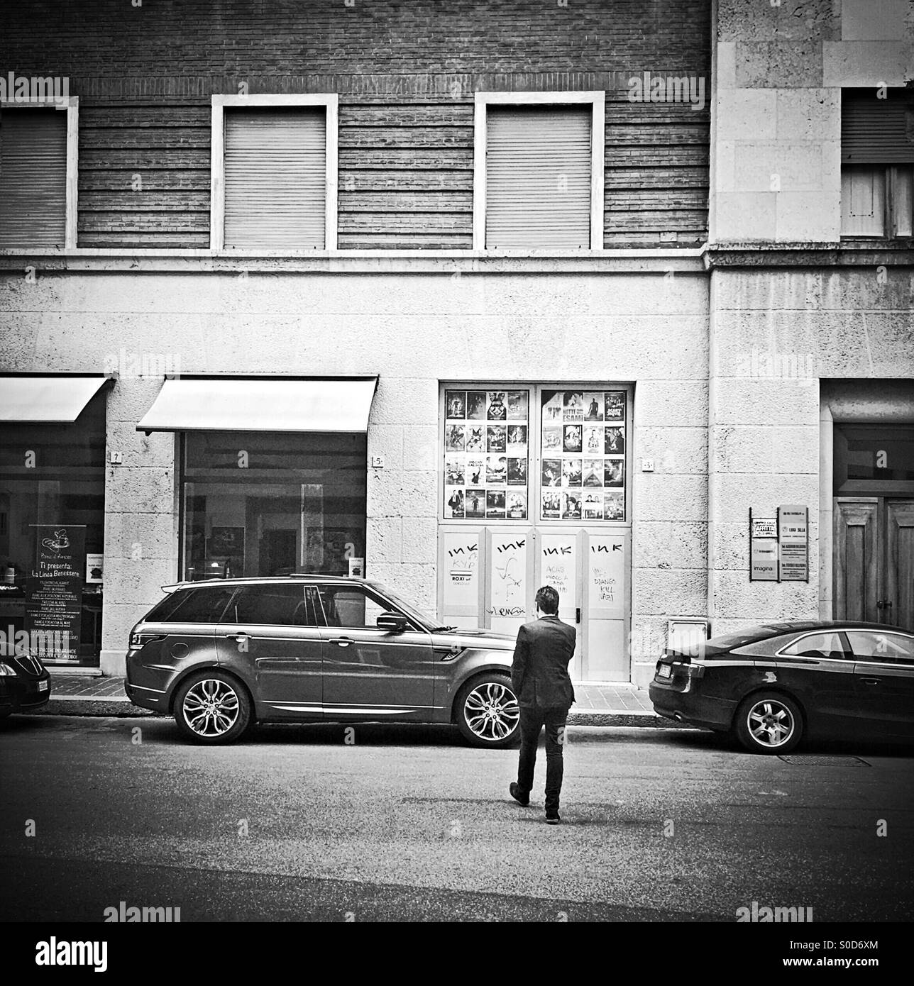 Business man and his new range rover sport - Smartphone Captured Stock Image