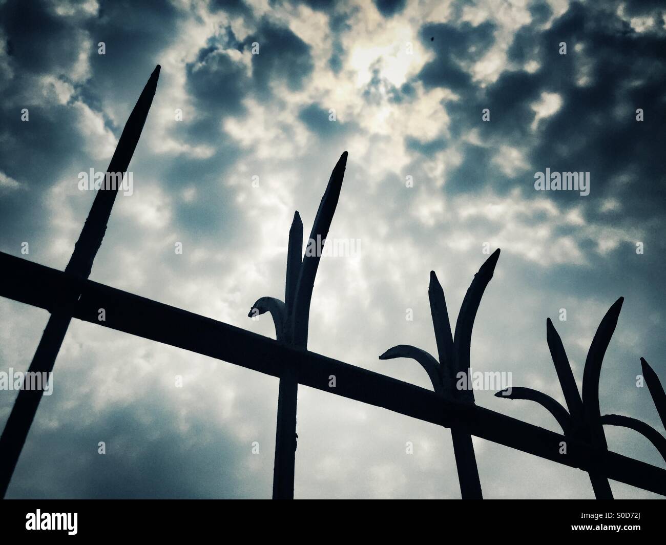 Barbed fence against dramatic sky - Smartphone Captured Stock Image