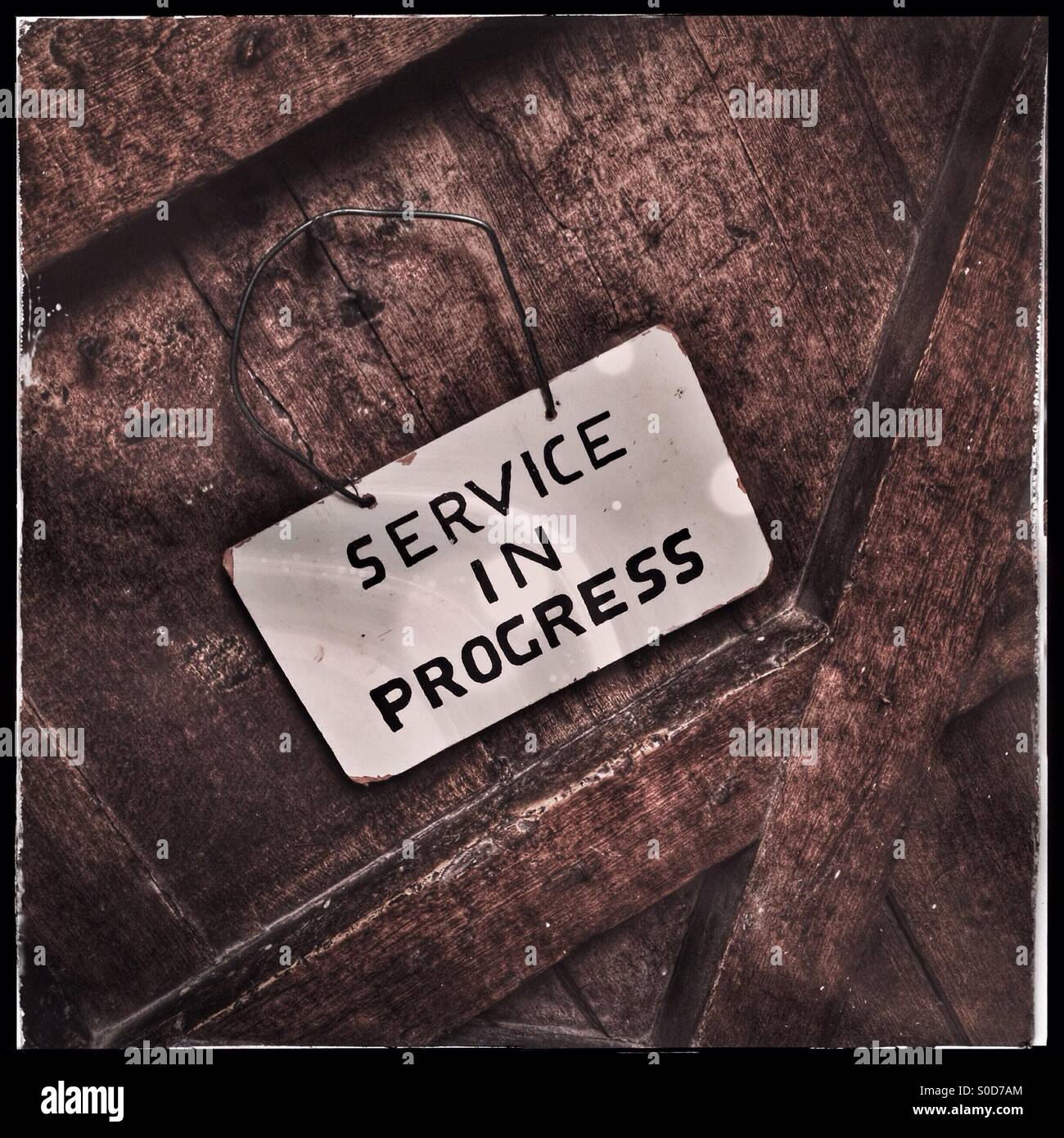 Sign on a church door - Smartphone Captured Stock Image