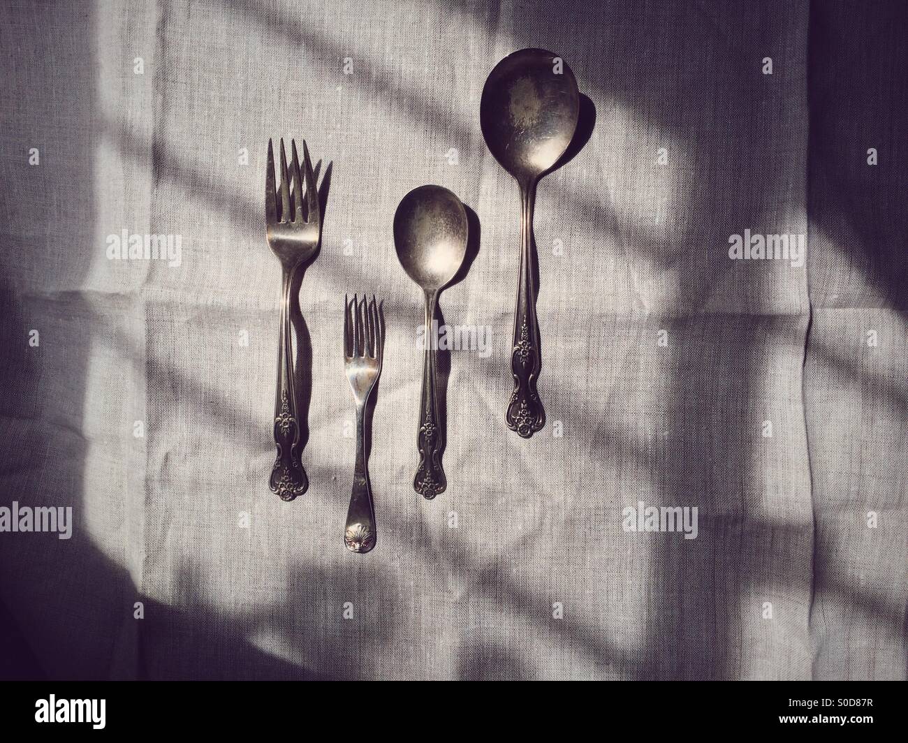 Old forks and spoons Stock Photo