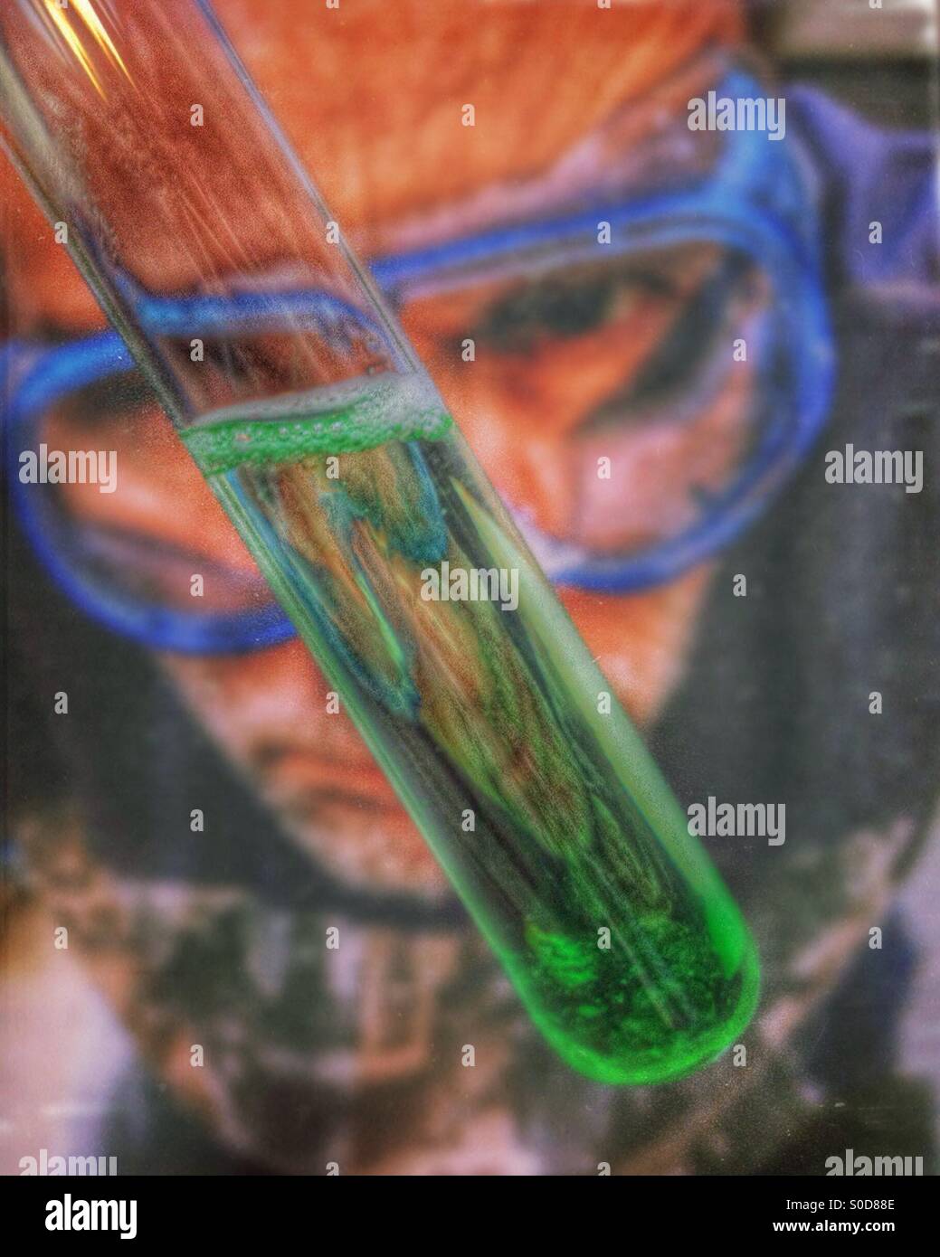 Scientist inspecting reaction in test tube - Smartphone Captured Stock Image