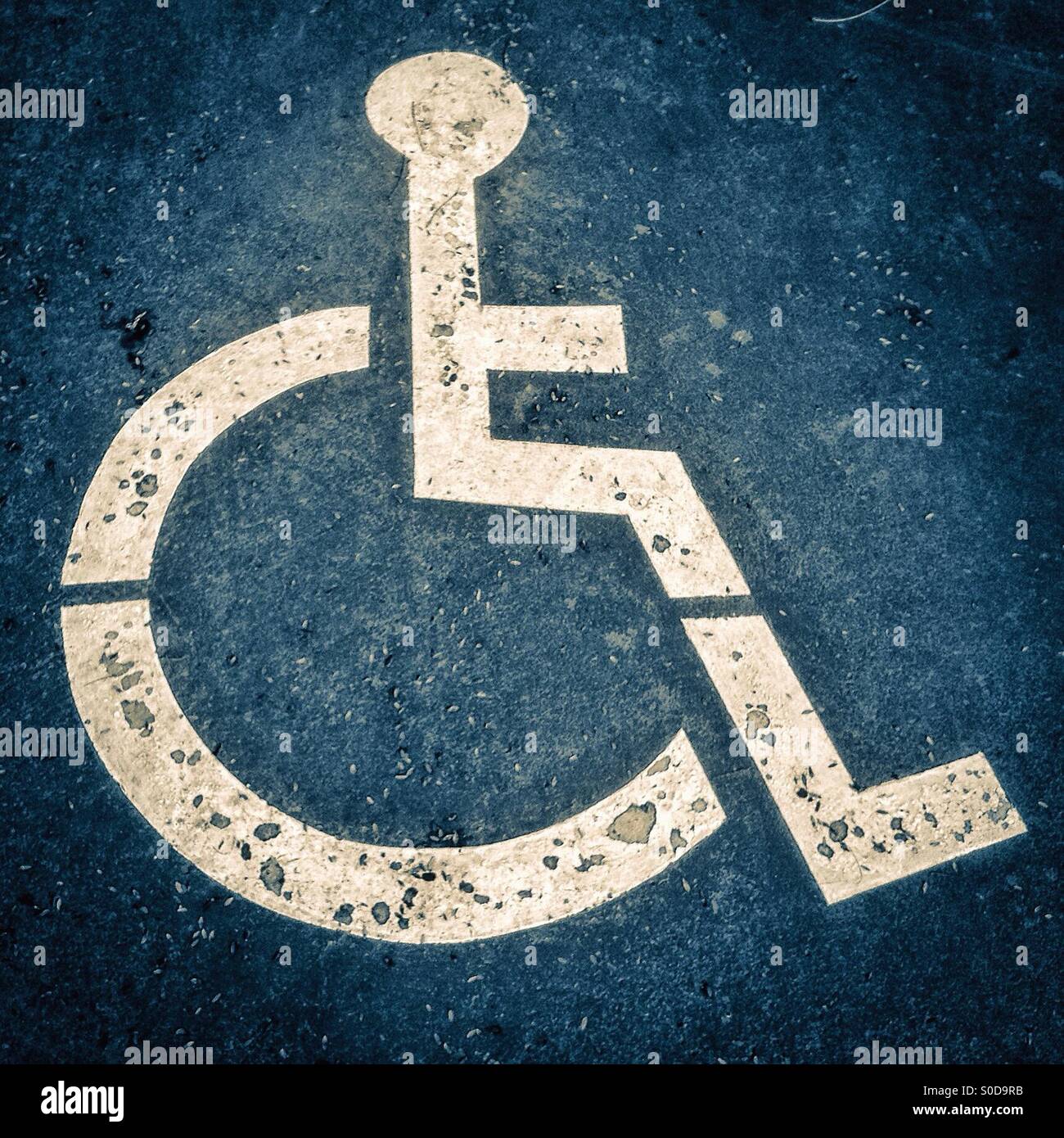 Handicapped disabled sign parking on road - Smartphone Captured Stock Image