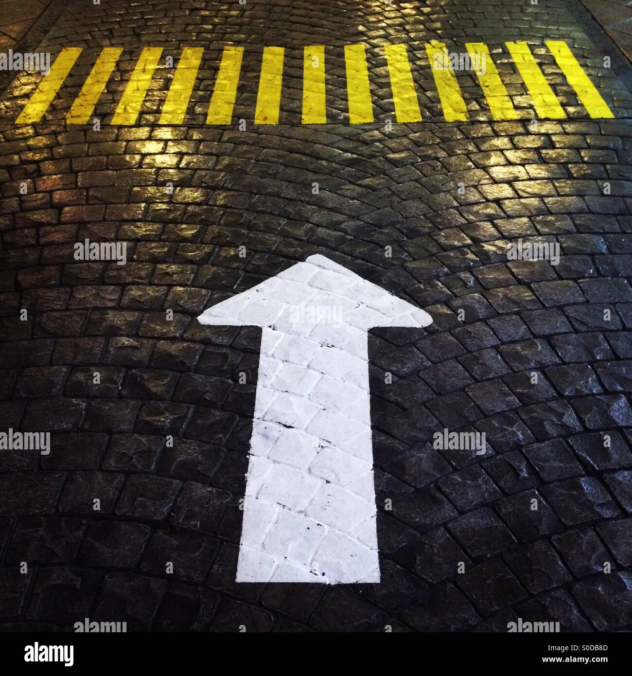 Go forward arrow on the road - Smartphone Captured Stock Image