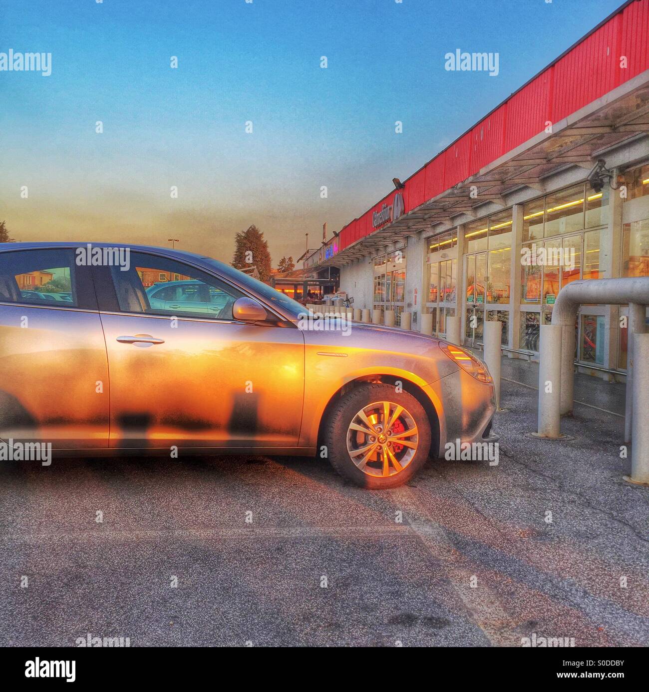 Alda romeo giuletta lited by the sun at the Golden hour - Smartphone Captured Stock Image