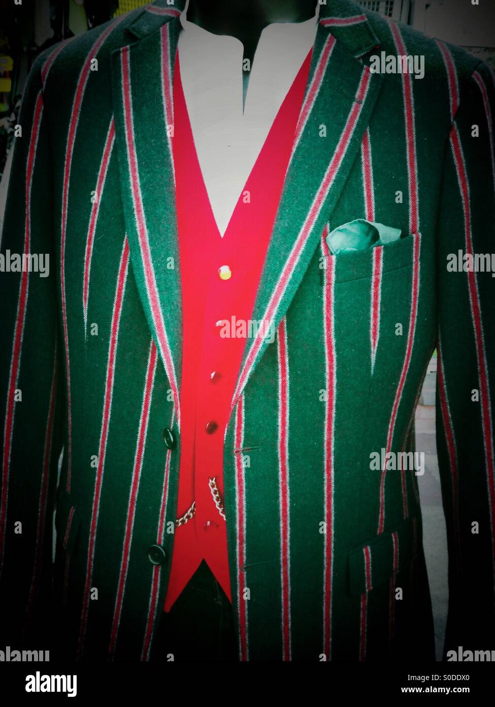 Green jacket with red waistcoat Stock Photo Alamy