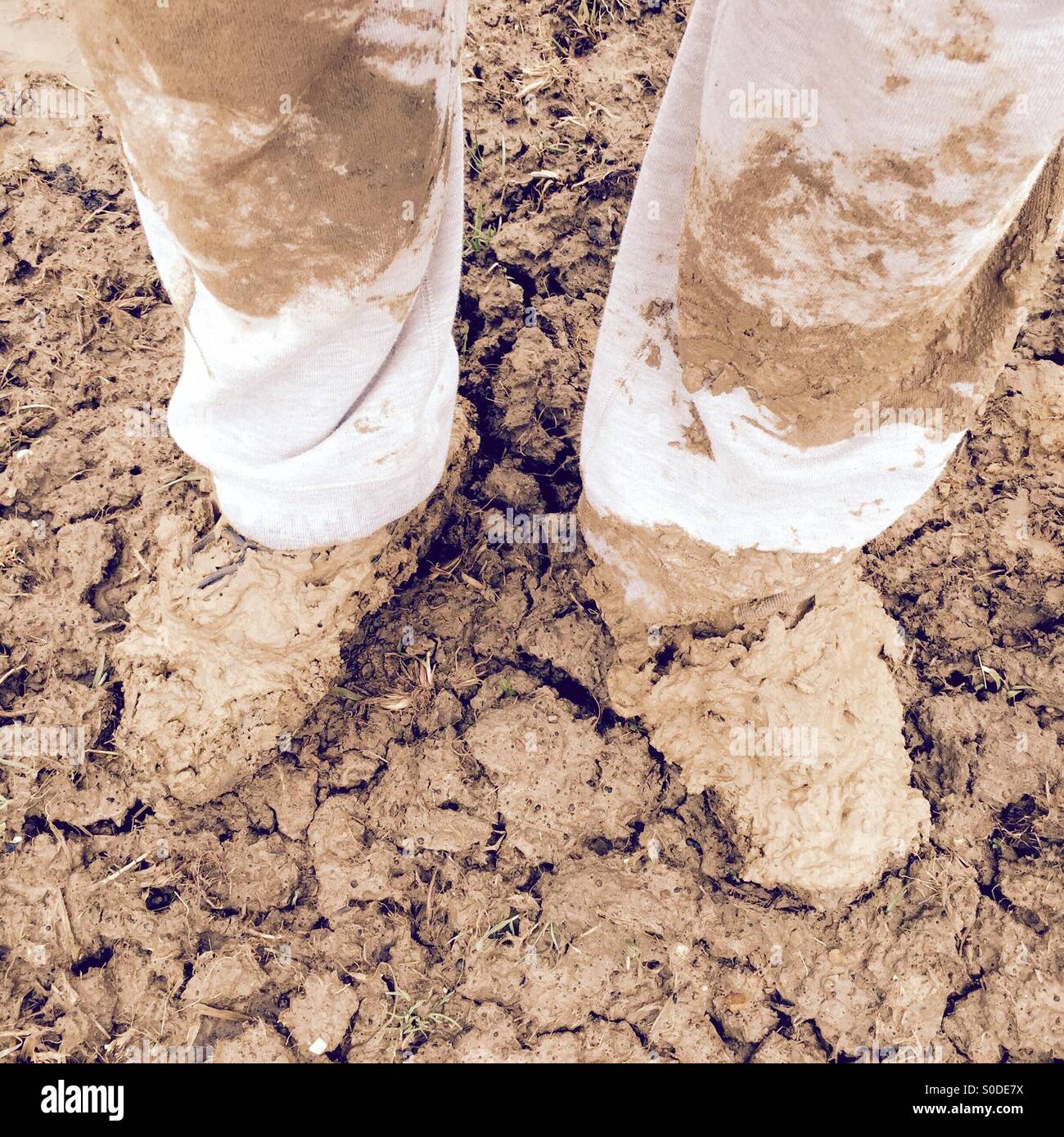 Extremely muddy shoes - Smartphone Captured Stock Image