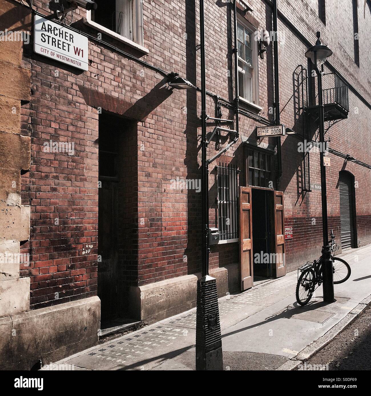 Soho, West End, Apollo Theatre stage door staff entrance in Archer Street W1 in London, England, United Kingdom - Smartphone Captured Stock Image