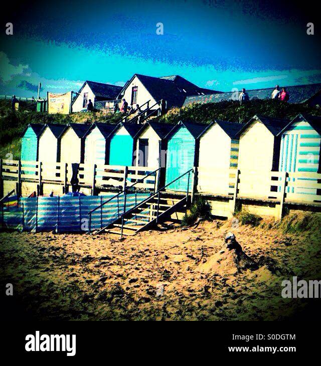 Beach huts on the beach at Bude. - Smartphone Captured Stock Image