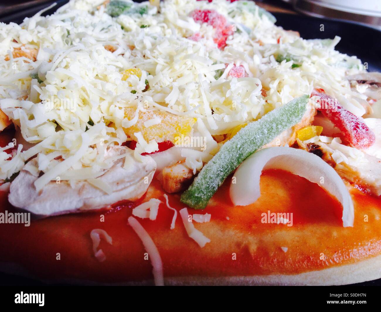 Home made pizza ready for the oven - Smartphone Captured Stock Image