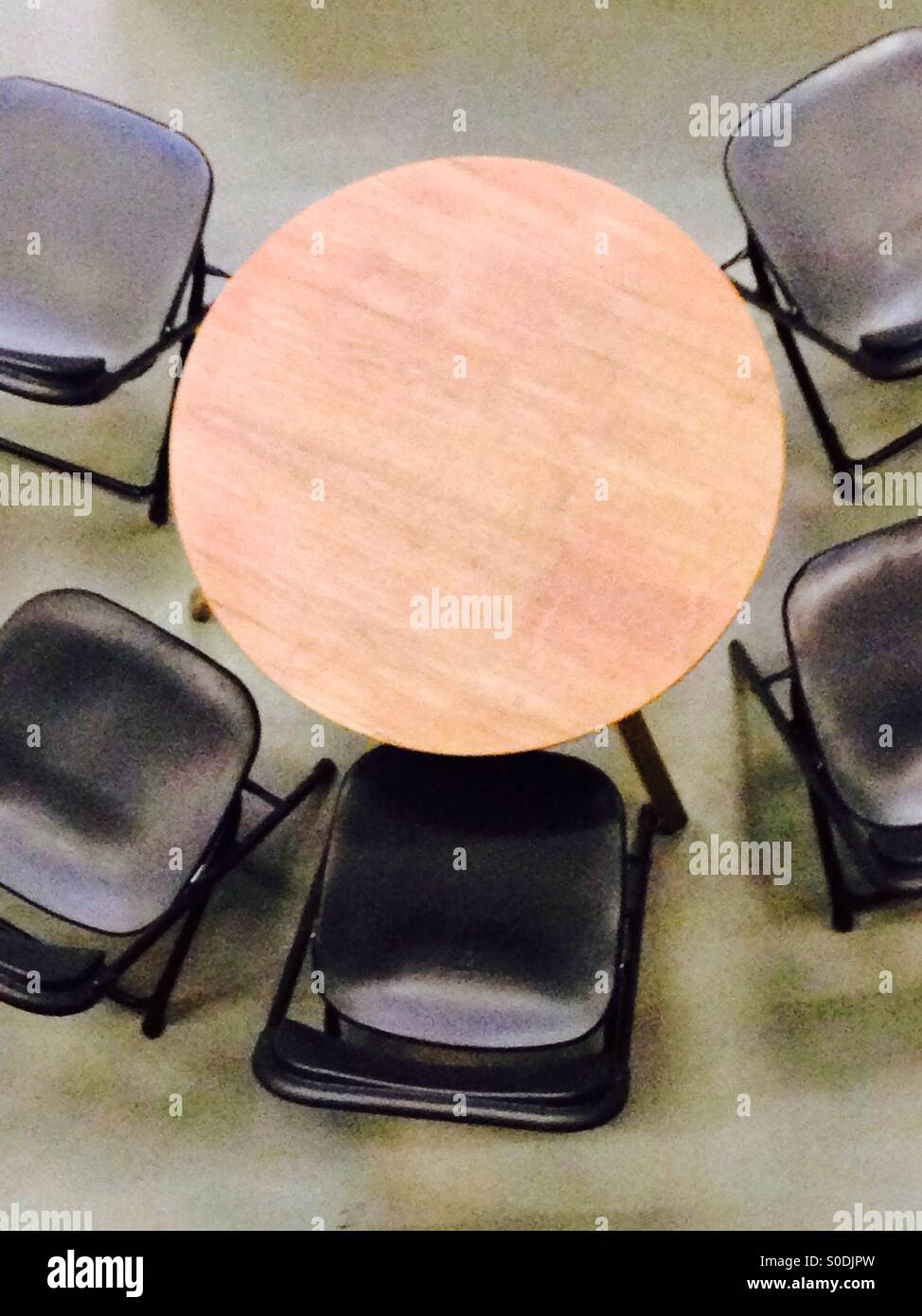 Round Table with chairs seen from above Stock Photo