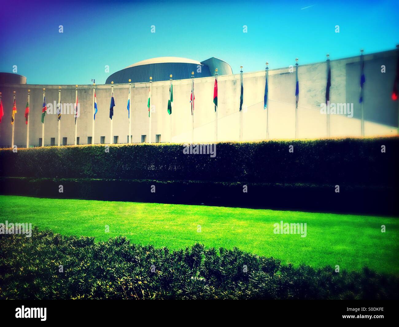 United Nations, General Assembly building and member nation flags - Smartphone Captured Stock Image