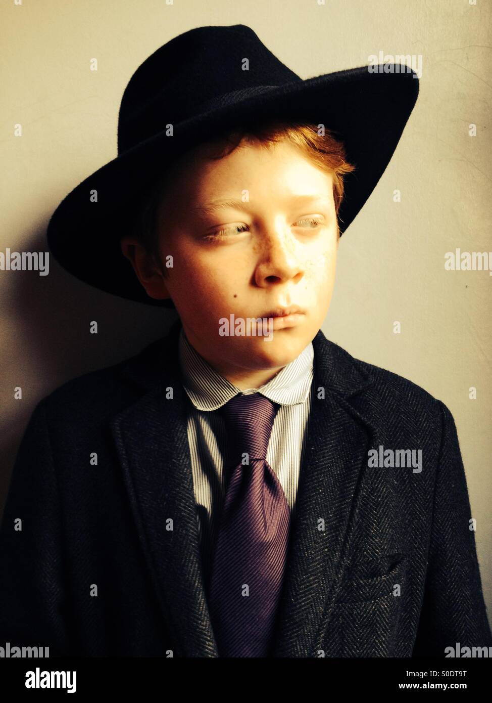 Ginger haired boy wearing a hat - Smartphone Captured Stock Image