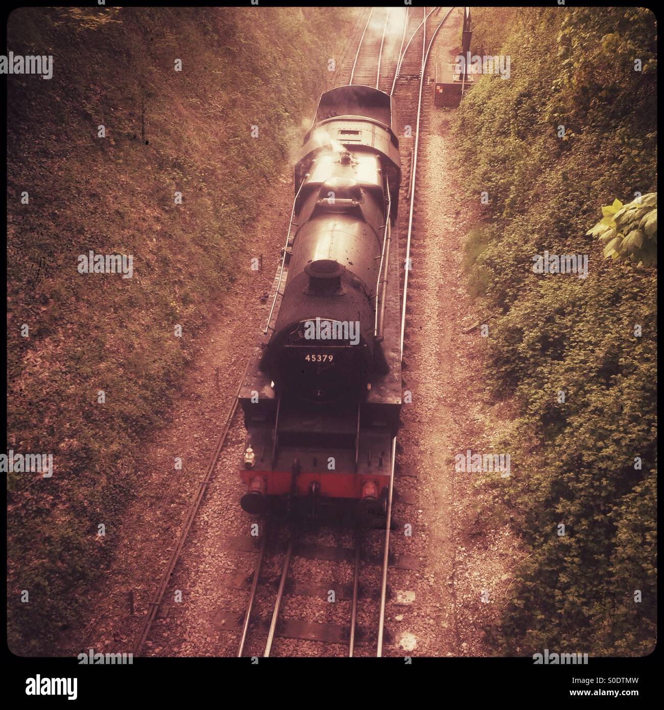 Steam train locomotive - Stainer black 5 number 45379 on the watercress line mid-Hants railway. Alresford, Hampshire, England. - Smartphone Captured Stock Image