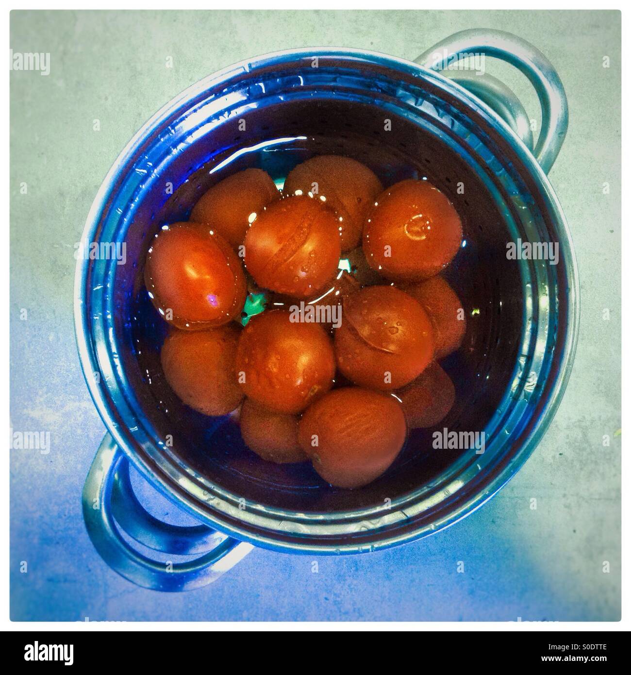 Fresh tomatoes cooked on a pot ready for a soup. Elevating point of view - Smartphone Captured Stock Image