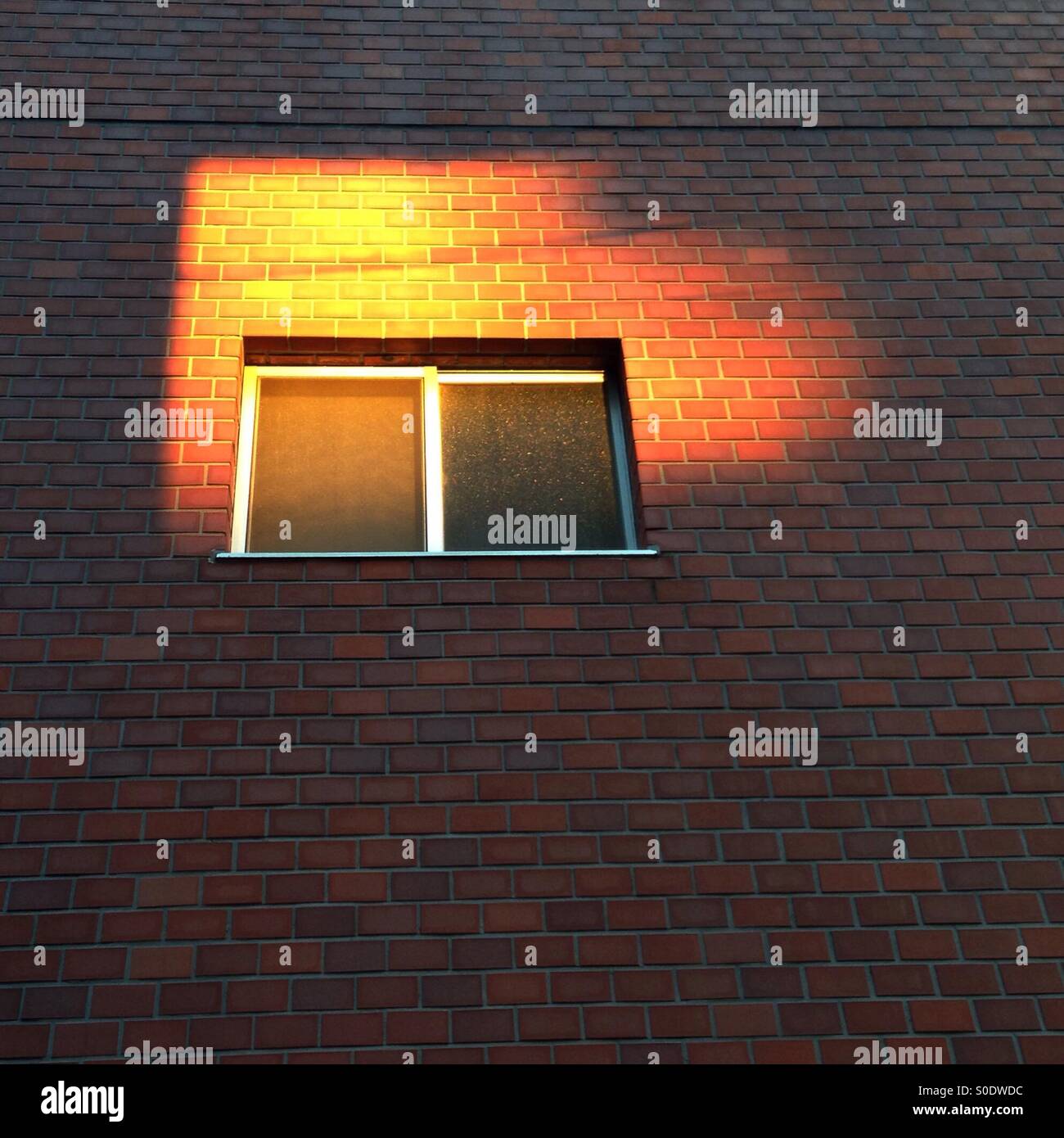 Setting Sun Spotlights Solitary >> Solitary Window In A Wall Illuminated By Setting Sun Stock Photo Setting Sun Spotlights Solitary >> Solitary Window In A Wall Illuminated By Setting Sun Stock Photo