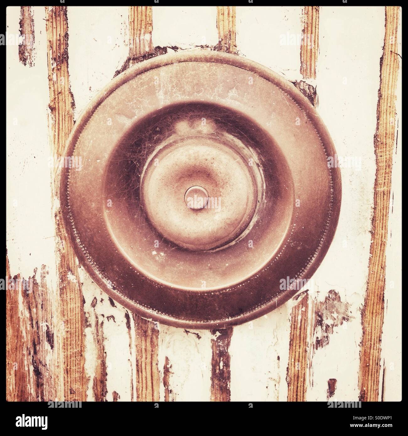 Old weathered doorbell, Broad street, Alresford, Hampshire, England. Stock Photo