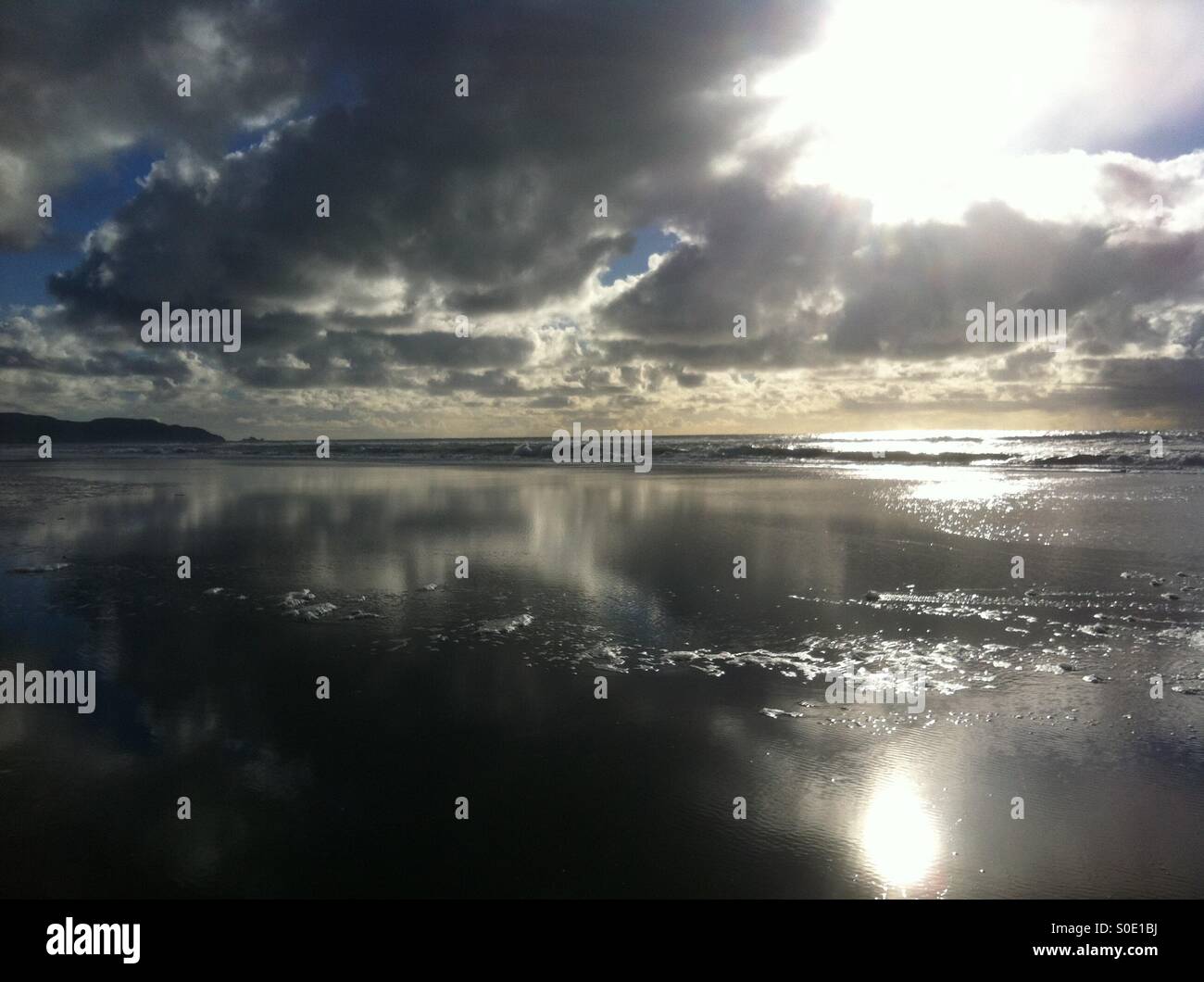 Northern California beach radiant reflections in the aftermath of a storm - Smartphone Captured Stock Image