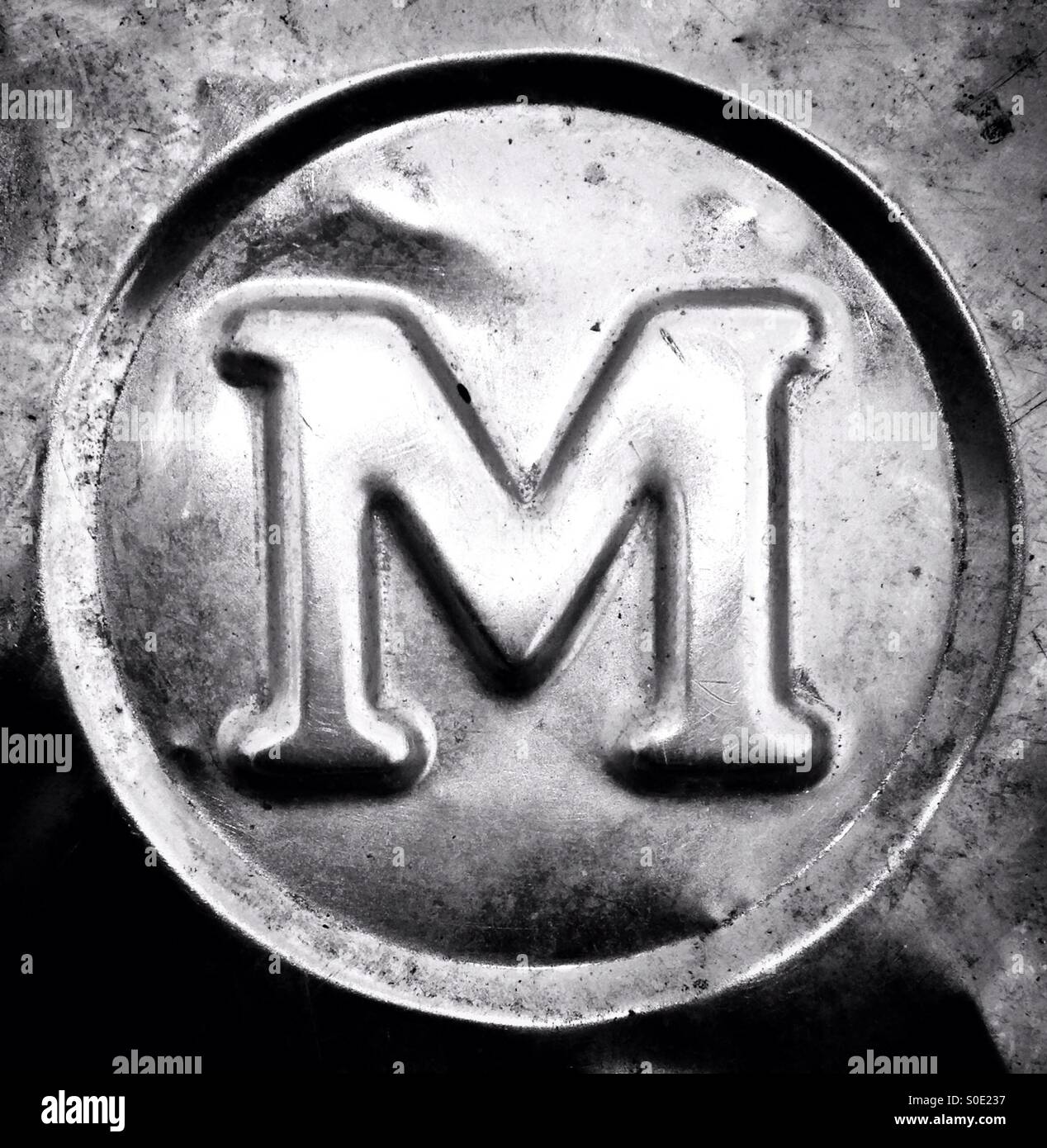 A chrome embossed capital letter M Stock Photo Alamy