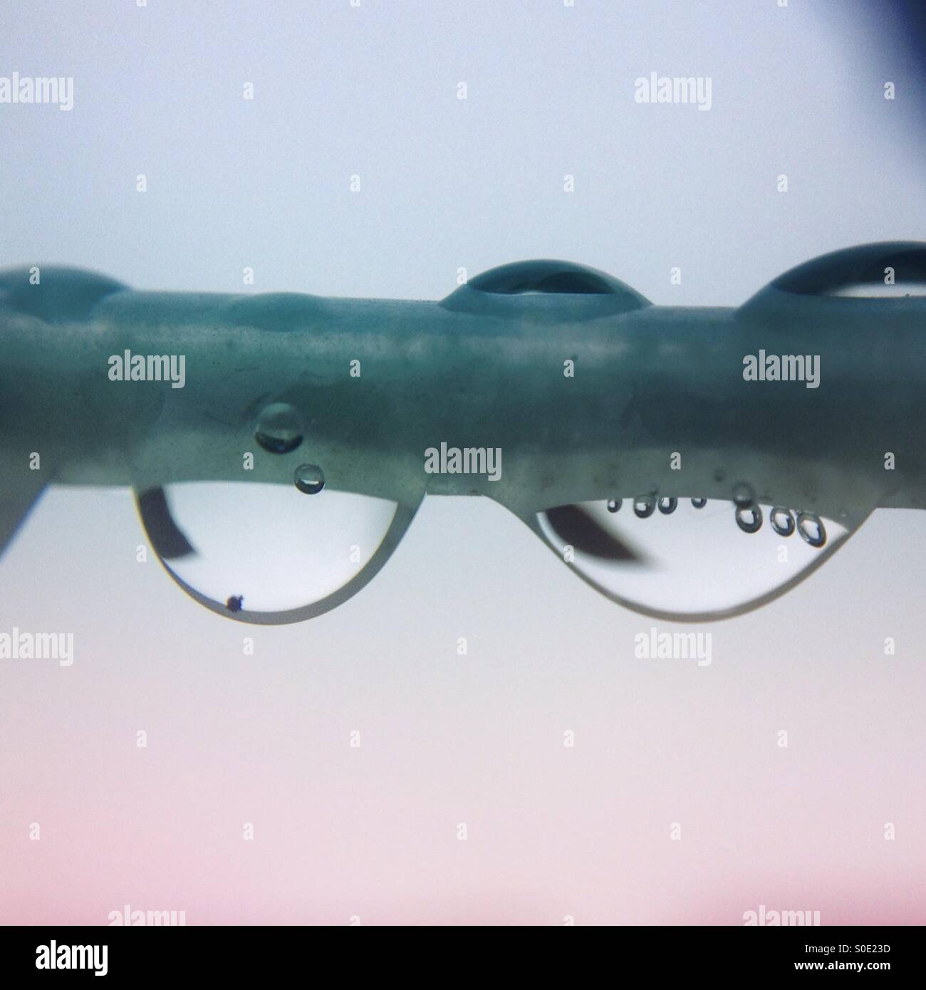 Rain drops on a washing line - Smartphone Captured Stock Image